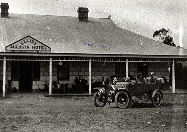Augusta Hotel with Vintage Car and People Black and White photo Augusta Hotel with Vintage Car and People Black and White photo